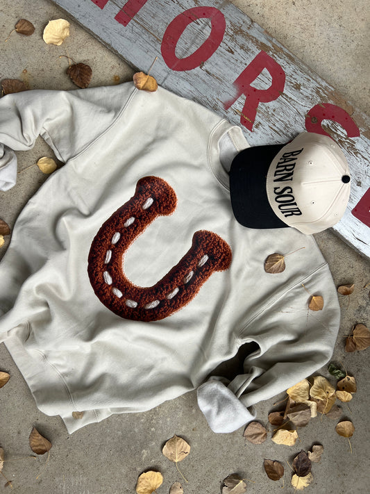 Stitched In Luck Pullover