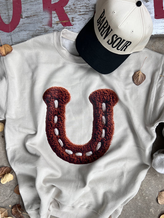 Stitched In Luck Pullover